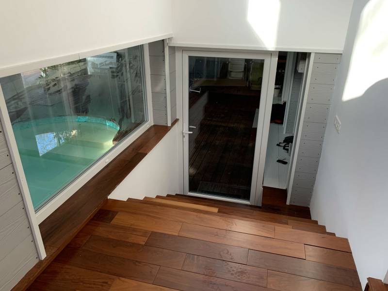 Mise en place de châssis fixes et d'une porte fenêtre en PVC blanc sur mesure - Réalisation ECO FENETRES (31140)
