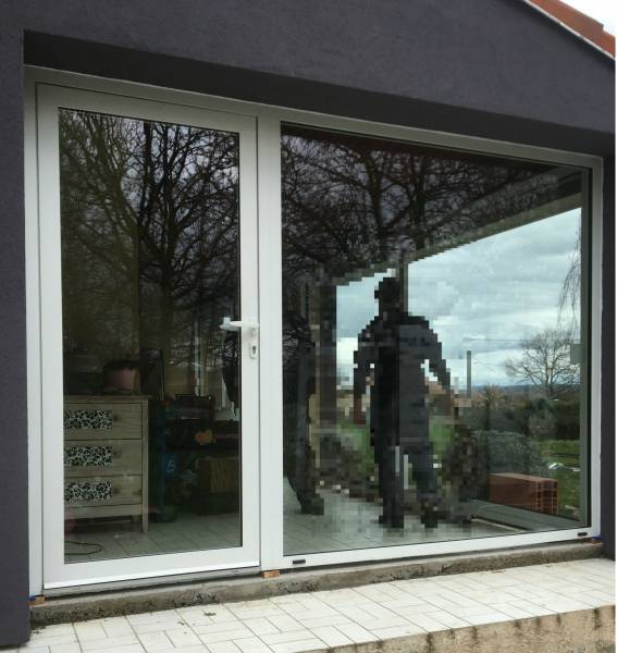 Fermeture de terrasse sur mesure en aluminium réalisée par Eco Fenêtres