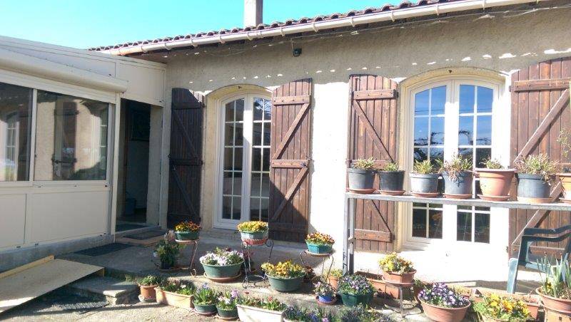 Remplacement des menuiseries extérieures en PVC arc surbaissé réalisé par Eco Fenêtres (31140)